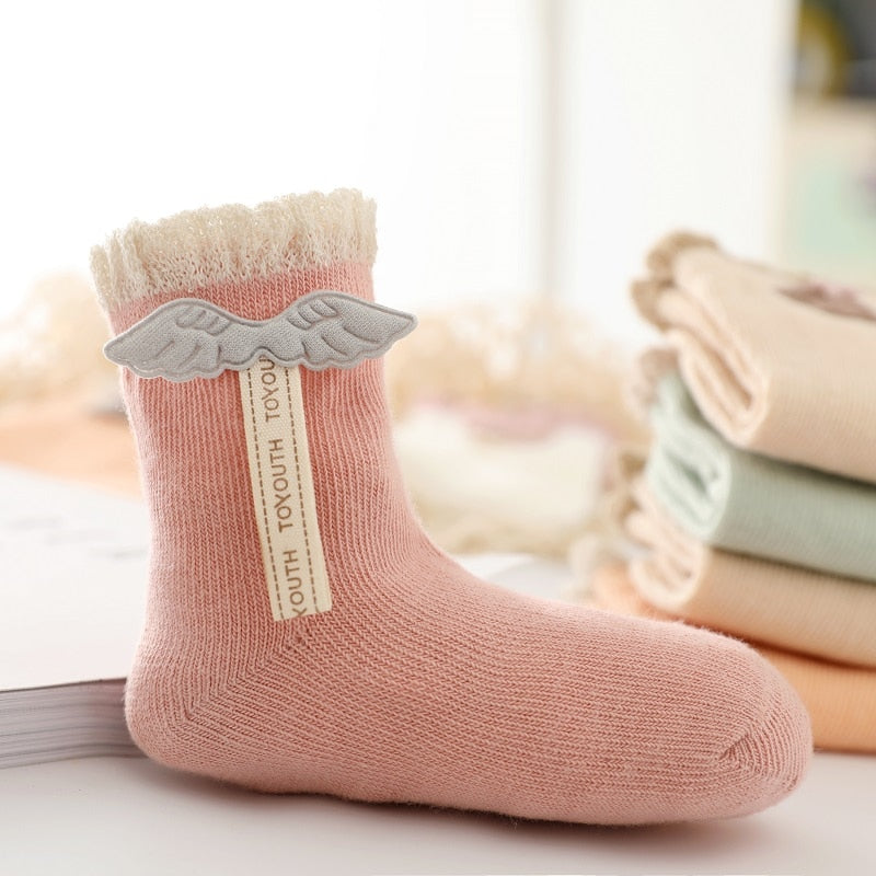 Cartoon socks for newborns in cotton and for children