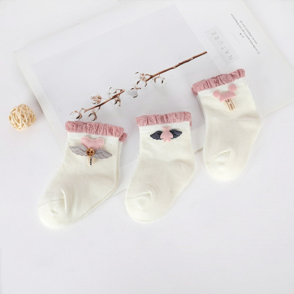Cartoon socks for newborns in cotton and for children