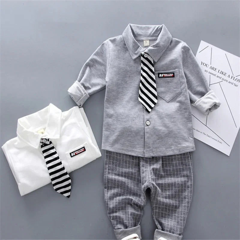 Landon Boy's 2-piece long-sleeved shirt with tie and pants - GuGuTon baby store - Baby Fashion - Toddlers Outfits - Babies Outfits - Toddler Clothes - Kids Clothing - Newborn Clothes - Newborn Wear - Kids Wear - Trending Clothes - Trending Outfits - Fall Fashion - Winter Fashion - Girls Clothes - Boys Clothes - Babies Wear - Kids Accessories - KidsWear - Summer Clothes - Summer Fashion - Summer Trend - Falls Sweaters - Tops - Bottom - Jeans - Blouse - Dresses - Newborn Dresses - Toys