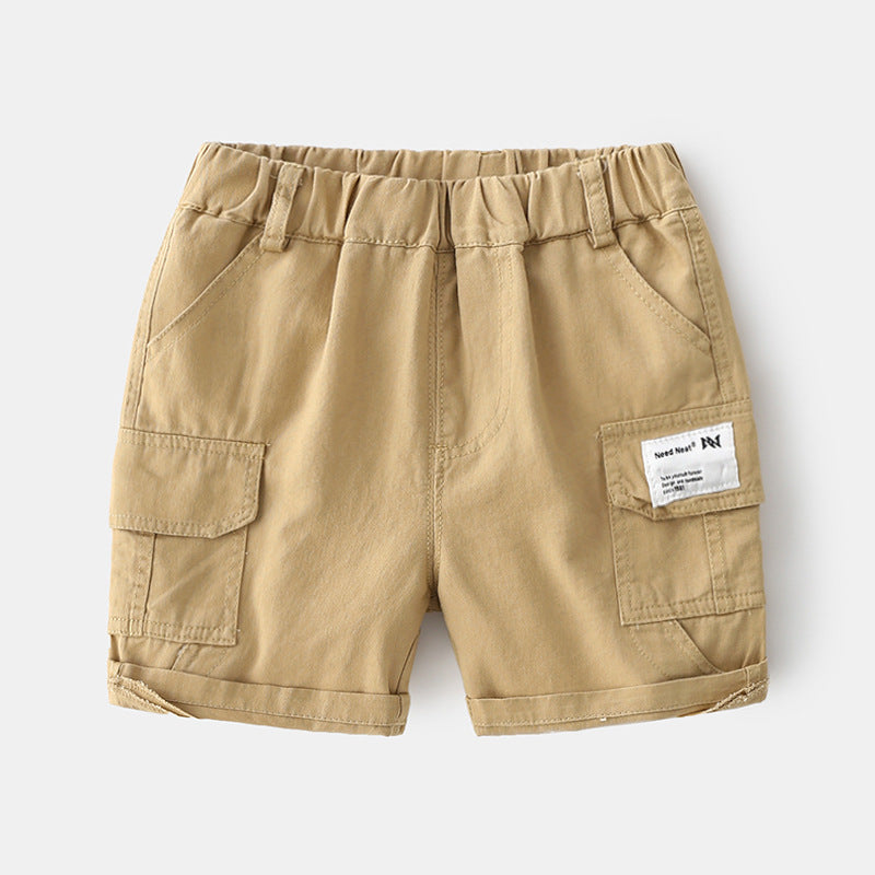 Beige toddler cargo shorts with elastic waistband and side flap pockets on white background