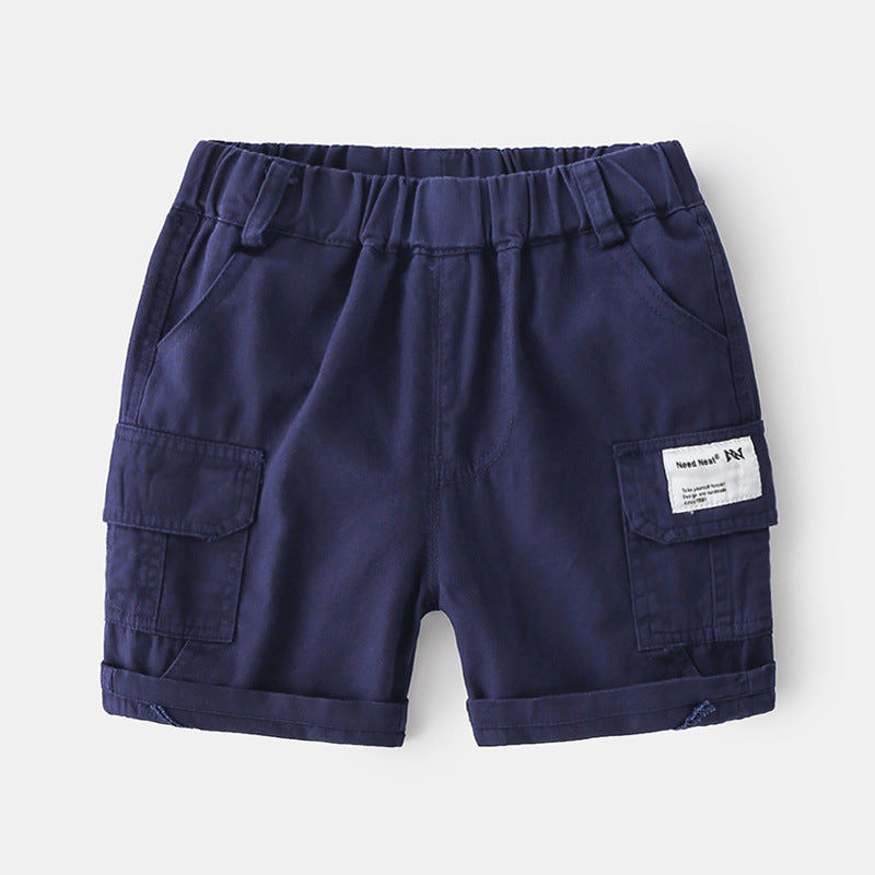 Navy blue toddler cargo shorts with elastic waistband and side pockets on white background