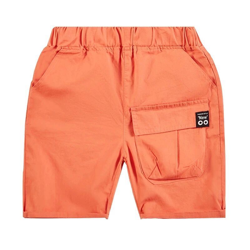 Orange kids' shorts with elastic waistband and side cargo pocket with 'New' label