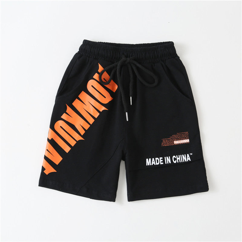 Black casual shorts with orange diagonal text and white Made in China label, elastic waist with drawstring