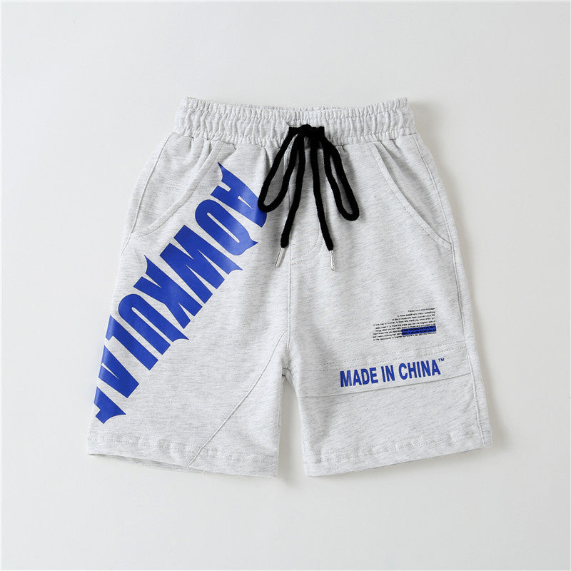 Light gray casual shorts with black drawstring, blue bold text HOWKULA and MADE IN CHINA print