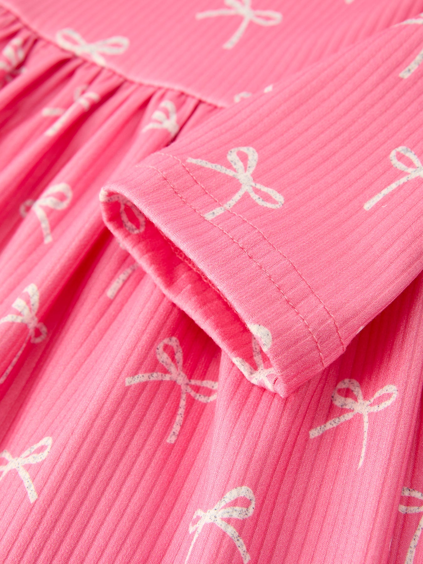 Carmelia Christmas Bow Girls Dress: Festive and Adorable Design