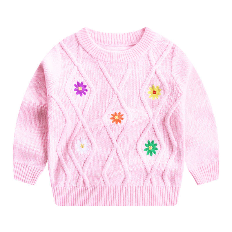 Pink knitted sweater with colorful embroidered flowers and diamond cable knit pattern