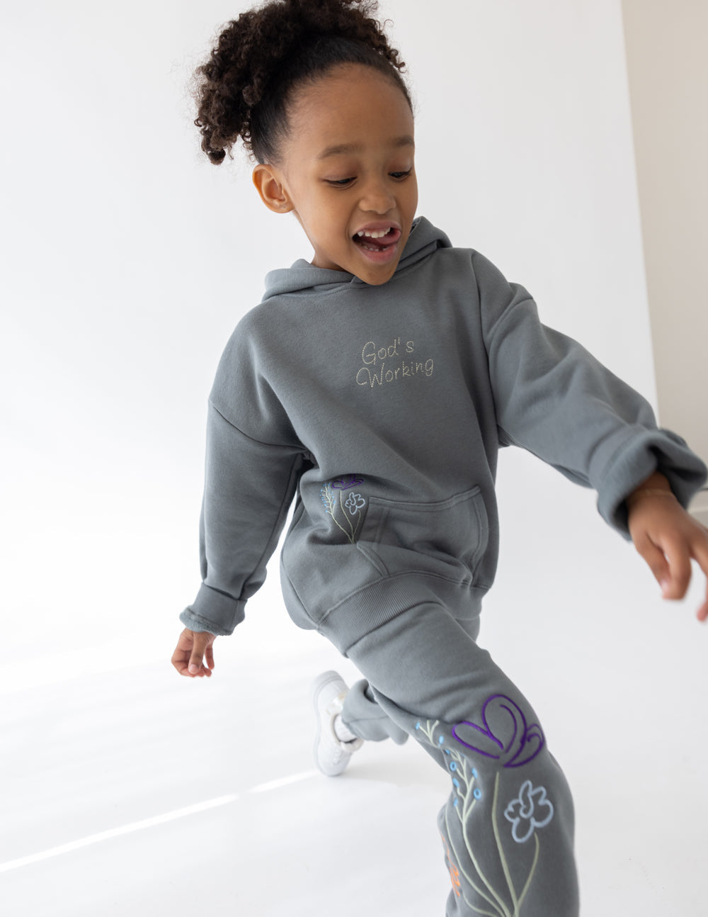 Natalia God's Still Working Kids Hoodie