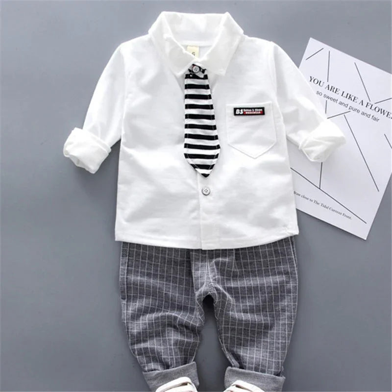 Landon Boy's 2-piece long-sleeved shirt with tie and pants - GuGuTon baby store - Baby Fashion - Toddlers Outfits - Babies Outfits - Toddler Clothes - Kids Clothing - Newborn Clothes - Newborn Wear - Kids Wear - Trending Clothes - Trending Outfits - Fall Fashion - Winter Fashion - Girls Clothes - Boys Clothes - Babies Wear - Kids Accessories - KidsWear - Summer Clothes - Summer Fashion - Summer Trend - Falls Sweaters - Tops - Bottom - Jeans - Blouse - Dresses - Newborn Dresses - Toys