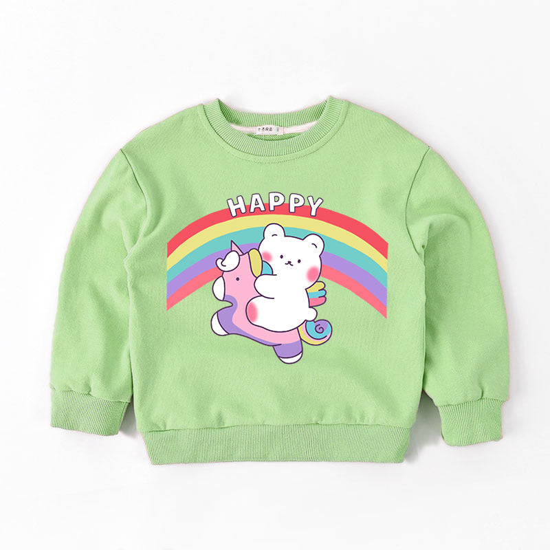 Light green kids sweatshirt with cartoon bear riding purple unicorn under rainbow and the word Happy