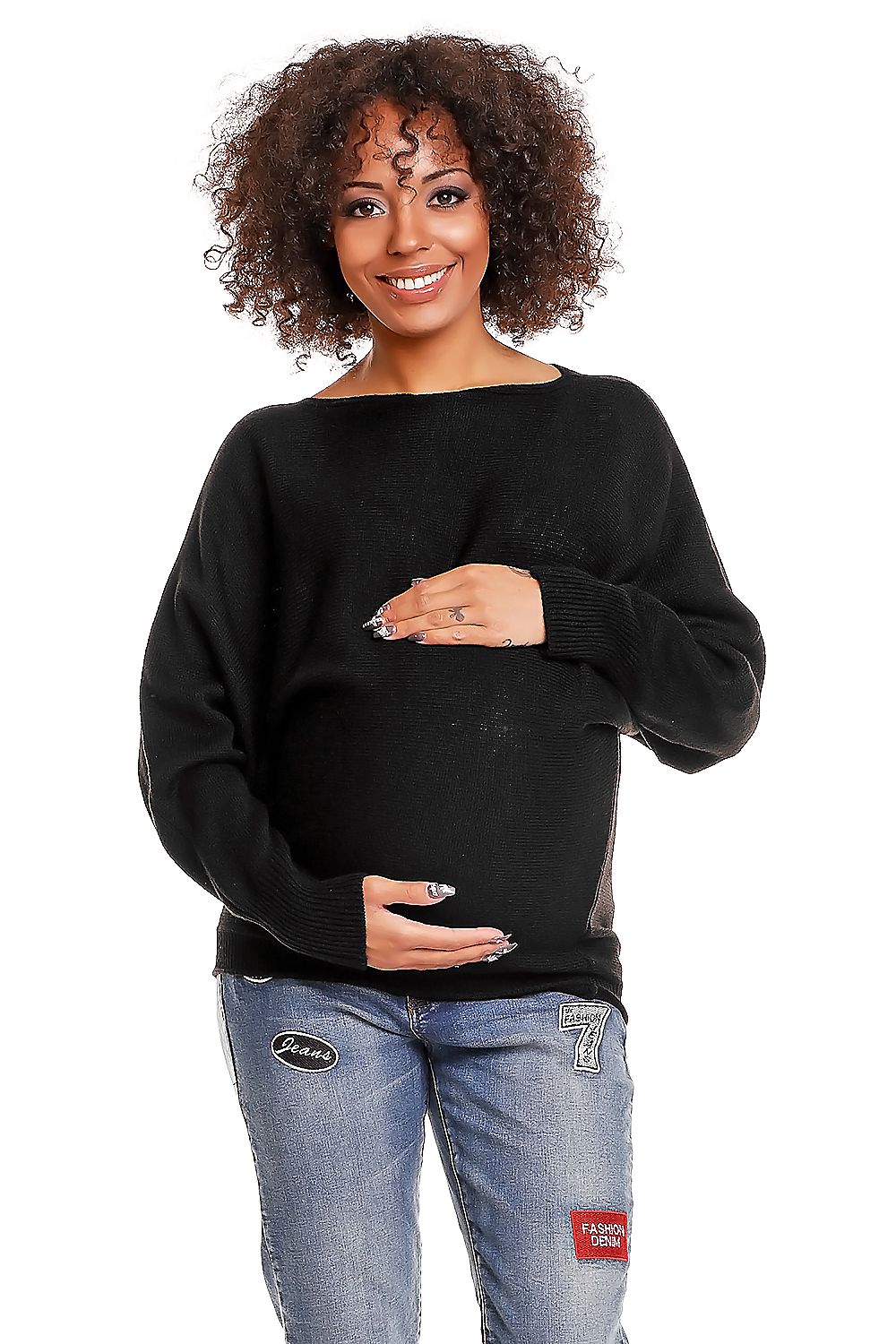 Woman wearing a black sweater and blue jeans on a white background