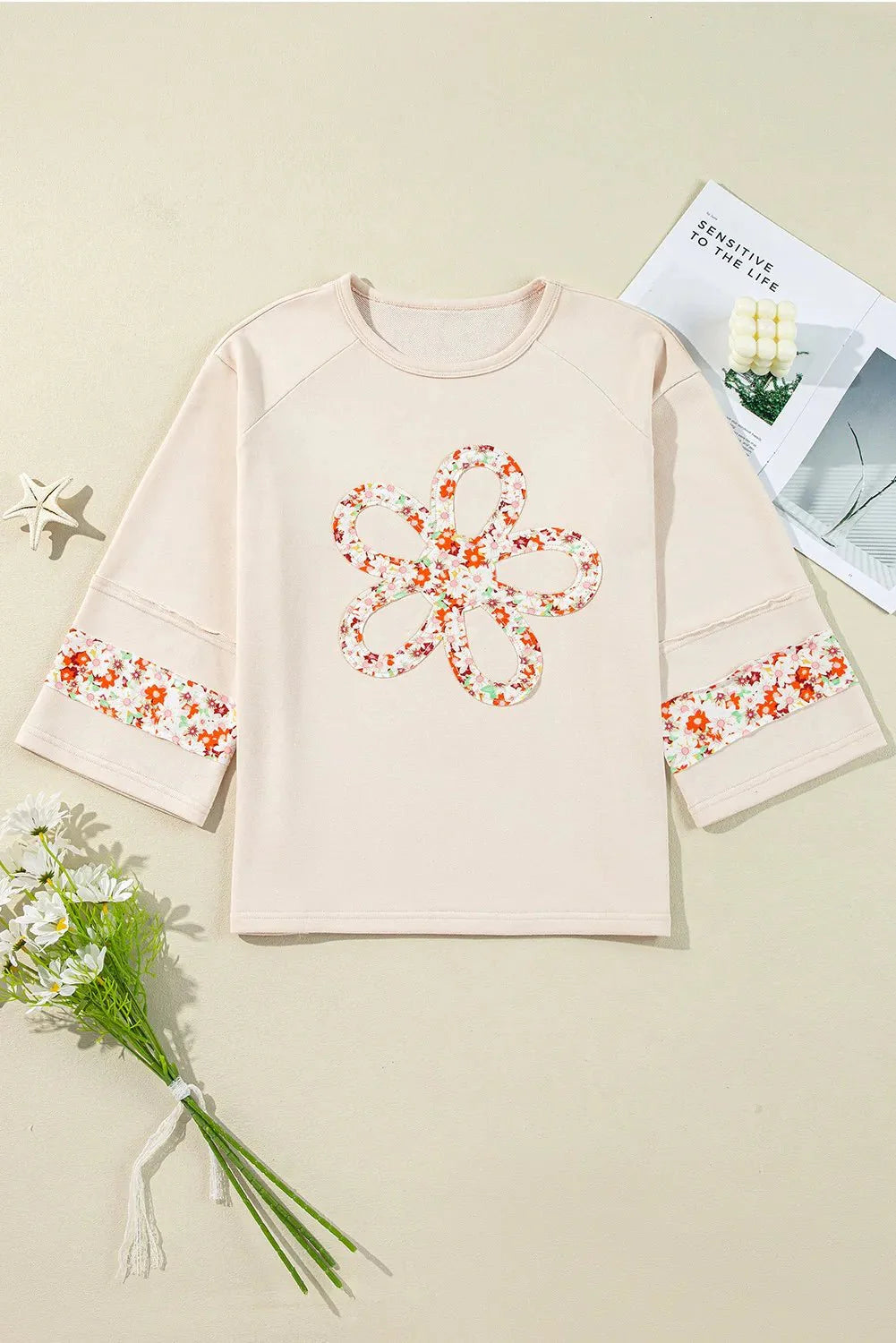 Sandra Exposed Seam Slit Floral Round Neck Tops