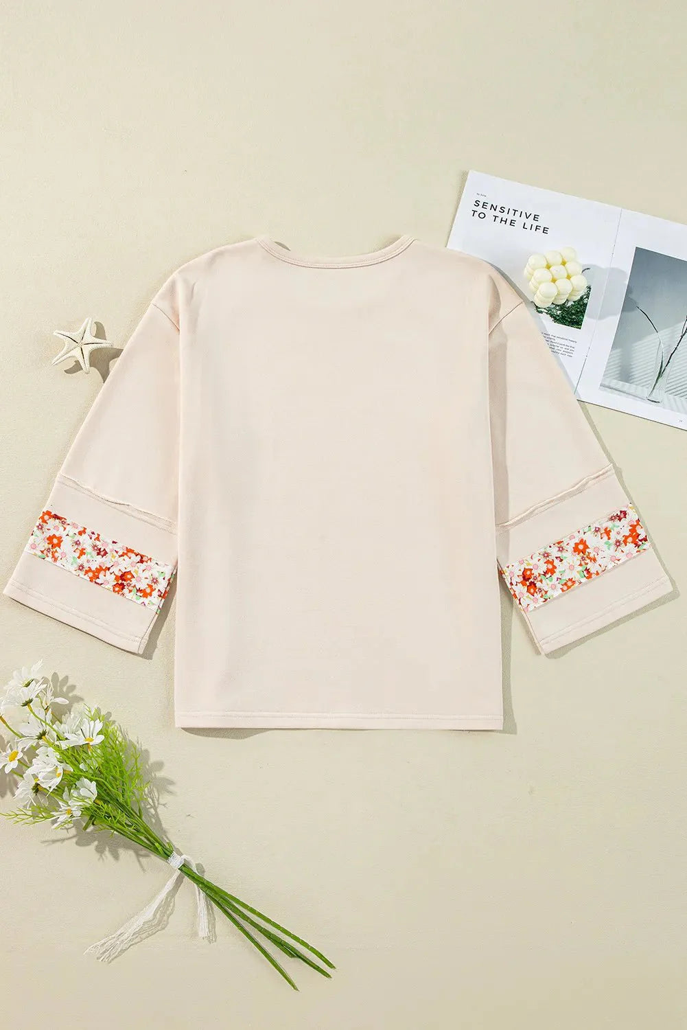 Sandra Exposed Seam Slit Floral Round Neck Tops