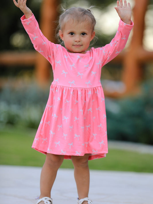 Carmelia Christmas Bow Girls Dress: Festive and Adorable Design