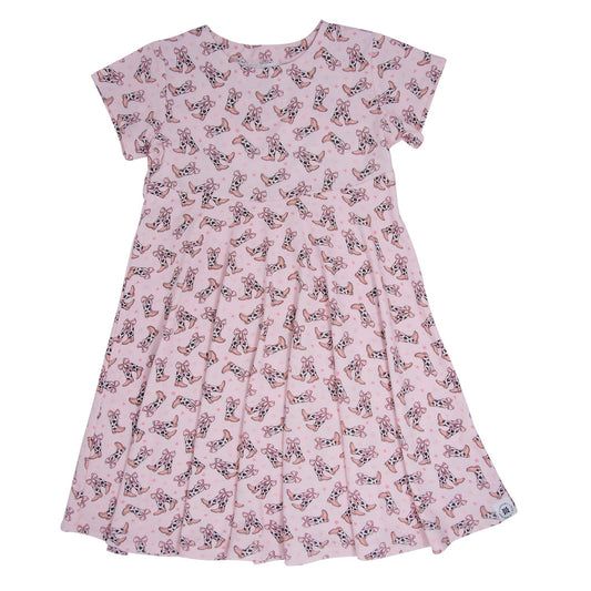 Swirly Girl Dress with cowhide boots and bows print in pink, featuring cap sleeves and flared skirt. Ideal for casual or dressy occasions.